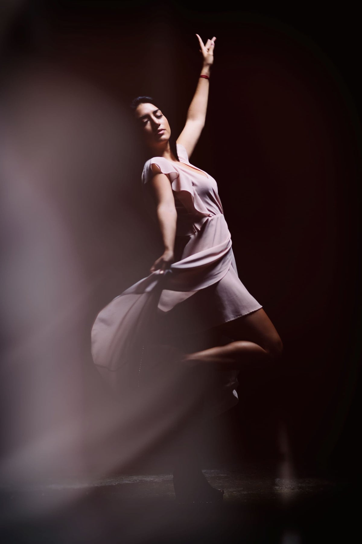 Woman dancing alone