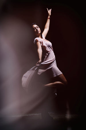 Woman dancing alone